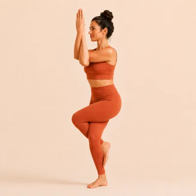 The full pose on the second side, with the right arm crossed under the left.