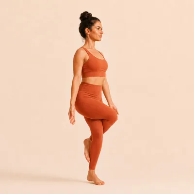 The leg wrap: right thigh crossed over the left with the foot hooked behind the calf.