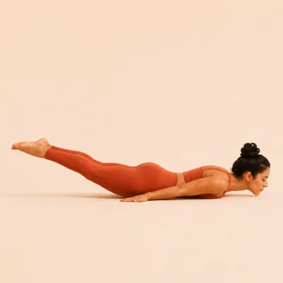 Locust Pose: both legs lifting away from the floor with the chest and chin still resting.