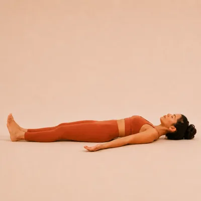 Lying on the back with the legs extended and the whole body at ease.