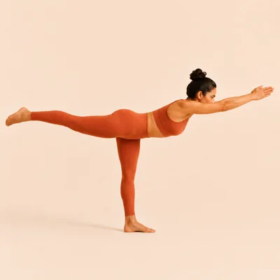 Warrior 3 balancing on the left leg, body forming one long line parallel to the floor.